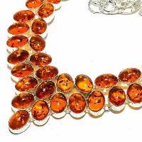 Amb 000 collier parure 70gr 15x10mm ambre miel baltique ethnique