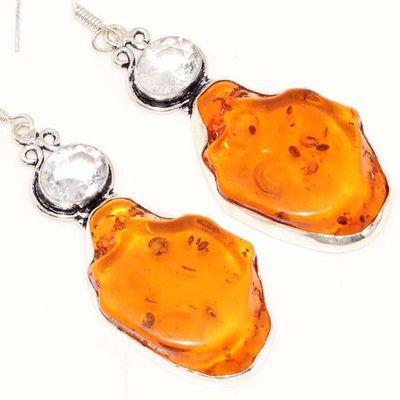 Amb 085c boucles oreilles ambre jaune miel topaze 15gr baltique achat vente bijoux argent 925