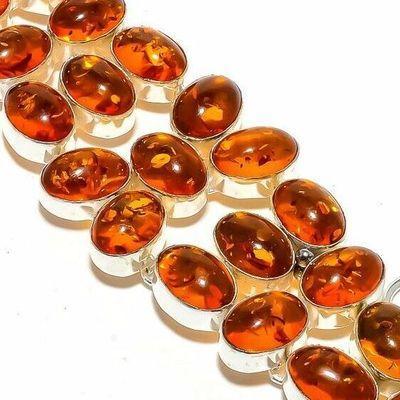 Amb 208c bracelet 43gr 15x10mm ambre miel baltique ethnique