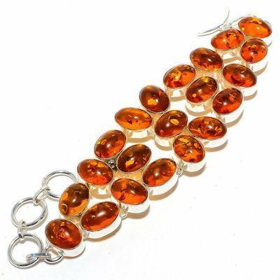 Amb 208c bracelet 43gr 15x10mm ambre miel baltique ethnique