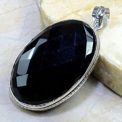 On 0358b pendentif onyx noir gemme pierre taillee achat vente bijou