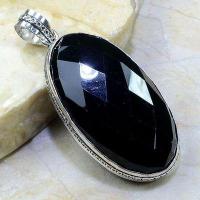 On 0378a pendentif onyx noir gemme pierre taillee achat vente bijou