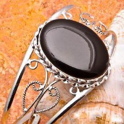 On 0688a bracelet torque onyx noir 22x32mm 24gr argent achat vente