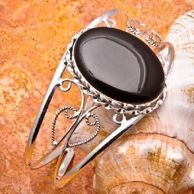 On 0688a bracelet torque onyx noir 22x32mm 24gr argent achat vente