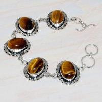 Ot 7919a bracelet oeil de tigre ethnique monture argent 925 achat vente bijoux