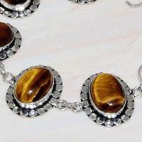 Ot 7919c bracelet oeil de tigre ethnique monture argent 925 achat vente bijoux