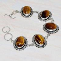 Ot 7919d bracelet oeil de tigre ethnique monture argent 925 achat vente bijoux