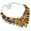 Ot 7963a collier parure oeil de tigre 124gr 15x25mm ethnique achat bijou argent 925