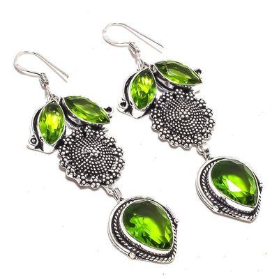 Per 652a boucles pendants oreilles peridot 10x15mm 21gr achat vente bijou argent 925