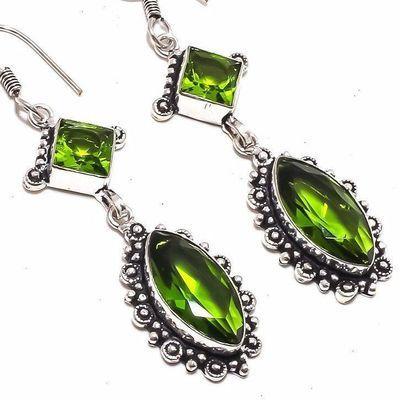 Per 657c boucles pendants oreilles peridot 10x20mm 14gr achat vente bijou argent 925