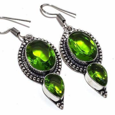 Per 663c boucles pendants oreilles peridot 10x18mm 13gr achat vente bijou argent 925