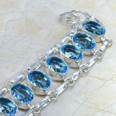 TPZ-037 - Superbe BRACELET avec 10 TOPAZES Bleu Suisse et argent 925 - 20 cm - 162 carats 32,4 gr