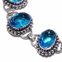 Tpz 687c bracelet 21gr topaze bleu suisse 15x10mm ethnique baroque bijou argent 925 vente achat