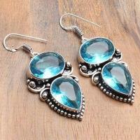 Tpz 741a boucles oreilles pendants 17gr 12x16mm paire topaze bleu suisse argent 925 vente achat