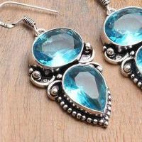 Tpz 741c boucles oreilles pendants 17gr 12x16mm paire topaze bleu suisse argent 925 vente achat