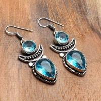 Tpz 742a boucles oreilles pendants 12gr 12x16mm paire topaze bleu suisse argent 925 vente achat