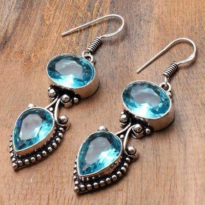 Tpz 743c boucles oreilles pendants 13gr 10x12mm paire topaze bleu suisse argent 925 vente achat