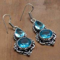 Tpz 752a boucles oreilles pendants 12gr 12x16mm paire topaze bleu suisse argent 925 vente achat