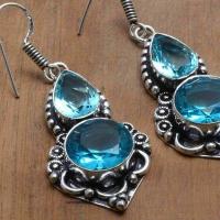 Tpz 752c boucles oreilles pendants 12gr 12x16mm paire topaze bleu suisse argent 925 vente achat