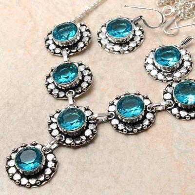 Tpz 761b collier boucles oreilles 31gr 10x15mm topaze bleu suisse argent 925 vente