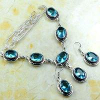 Tpz 767a collier boucles oreilles 34gr 10x15mm topaze bleu suisse argent 925 vente