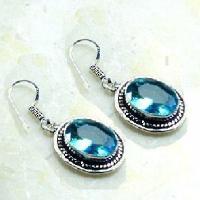 Tpz 767c collier boucles oreilles 34gr 10x15mm topaze bleu suisse argent 925 vente