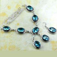 Tpz 767d collier boucles oreilles 34gr 10x15mm topaze bleu suisse argent 925 vente