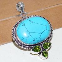 Tqa 242a pendentif pendant turquoise howlite peridots 24x32mm achat vente bijou argent 925